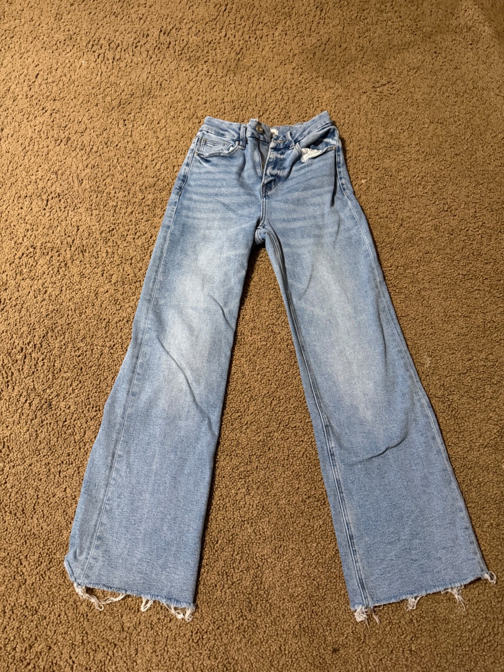 High-Rise Light Blue Wide-Leg Jeans with Frayed Hem